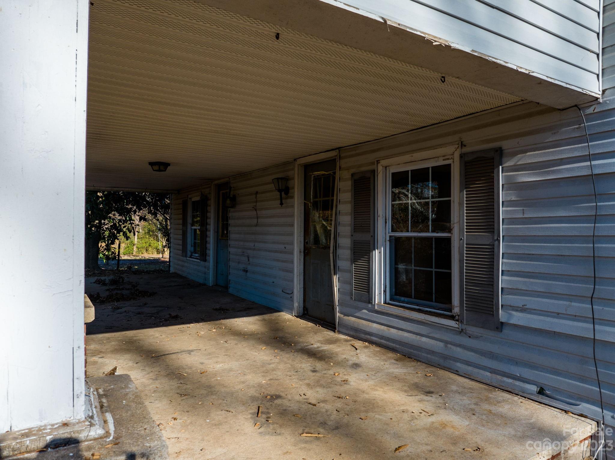 596 Old Mooresboro Road Mooresboro, NC 28114 - Photo 23 of 40 a view of a entryway door of the house