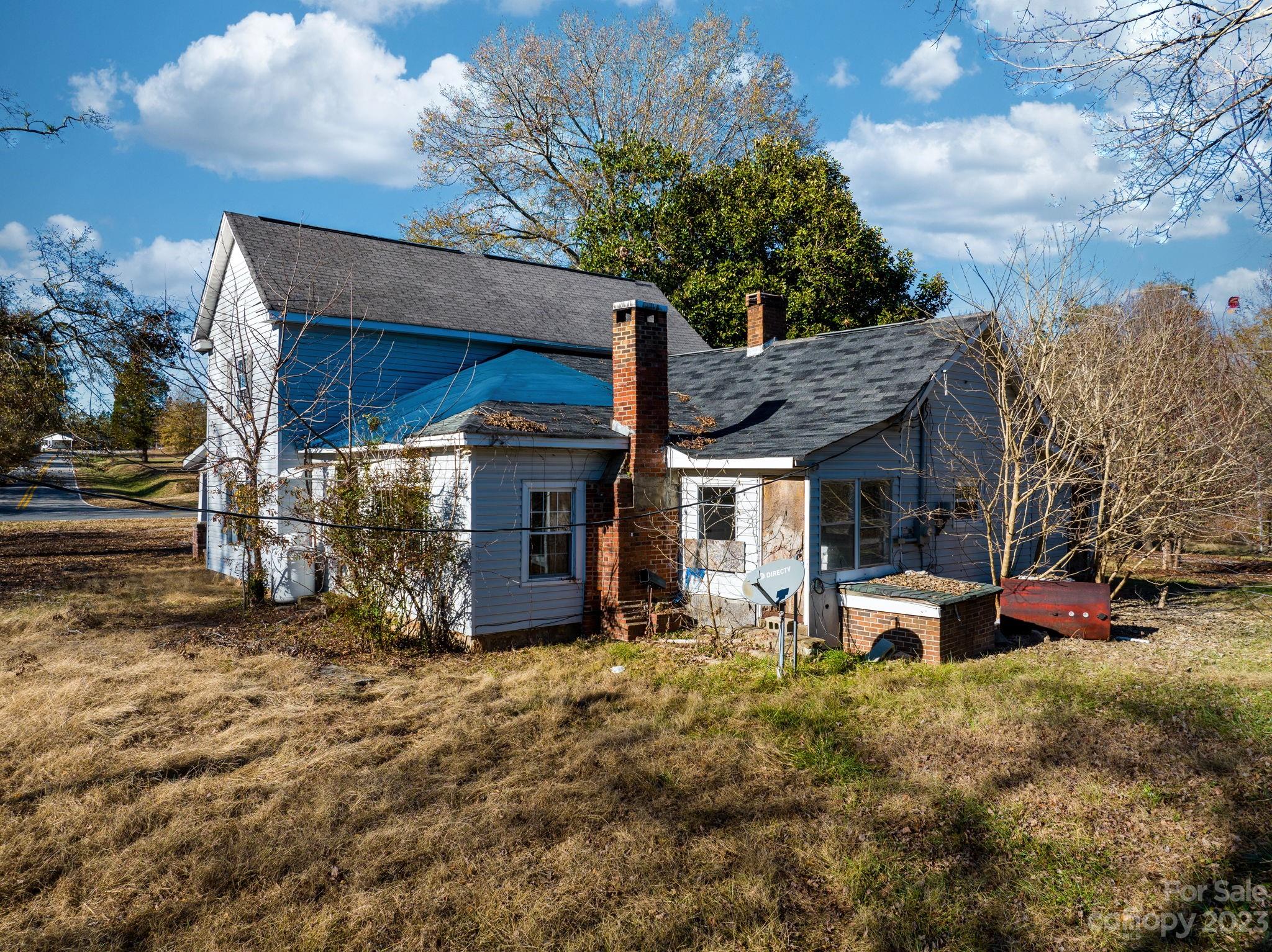 596 Old Mooresboro Road Mooresboro, NC 28114 - Photo 27 of 40 a view of a house with backyard