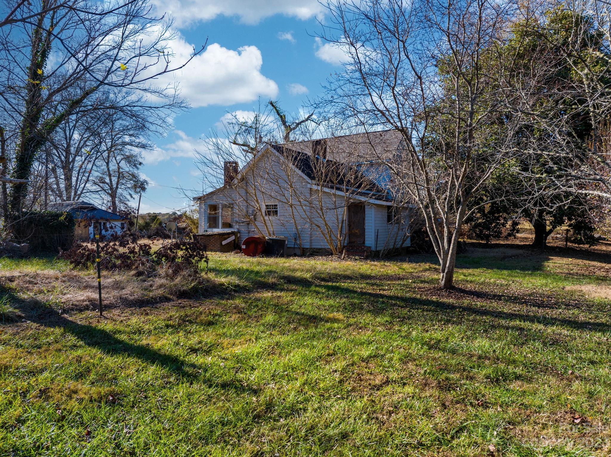 596 Old Mooresboro Road Mooresboro, NC 28114 - Photo 29 of 40 a view of a house with a yard