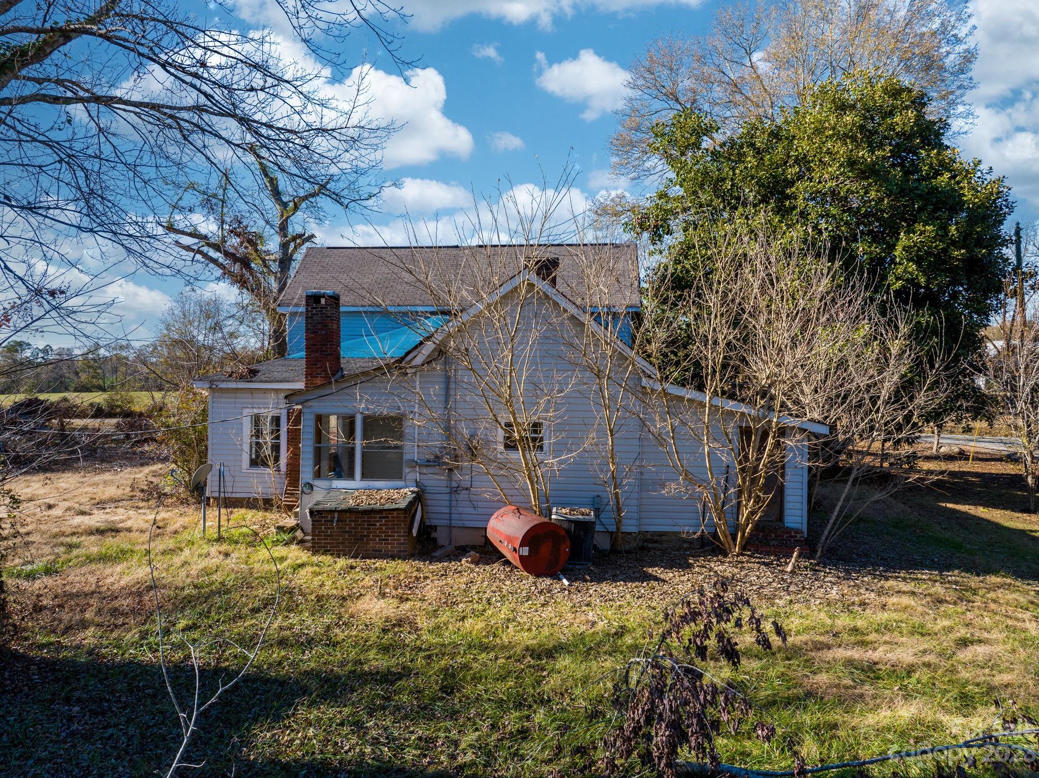 596 Old Mooresboro Road Mooresboro, NC 28114 - Photo 31 of 40 a view of a house with a yard