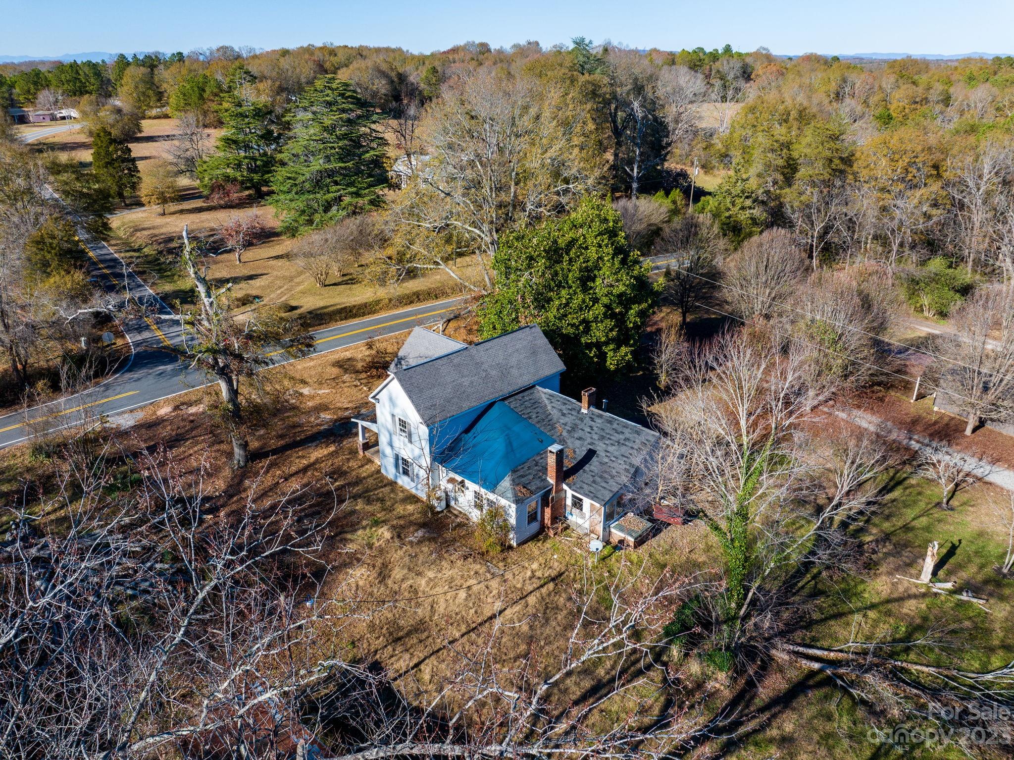 596 Old Mooresboro Road Mooresboro, NC 28114 - Photo 35 of 40 an aerial view of a house with mountain view