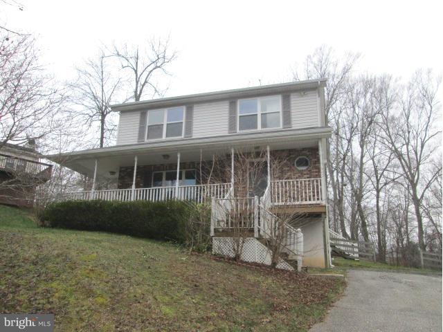 426 Rachaels Way Prince Frederick, MD 20678 - Photo 1 of 22 a front view of a house with a yard
