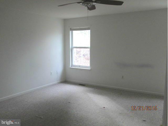 426 Rachaels Way Prince Frederick, MD 20678 - Photo 13 of 22 an empty room with a window