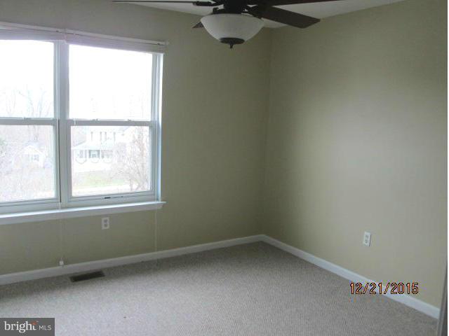 426 Rachaels Way Prince Frederick, MD 20678 - Photo 14 of 22 an empty room with a window