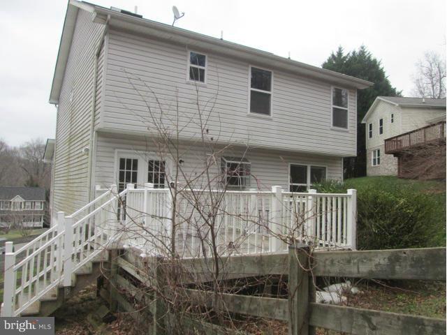 426 Rachaels Way Prince Frederick, MD 20678 - Photo 20 of 22 a view of house with a deck and furniture