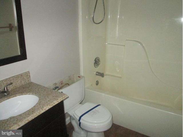 426 Rachaels Way Prince Frederick, MD 20678 - Photo 5 of 22 a bathroom with a granite countertop sink toilet and shower
