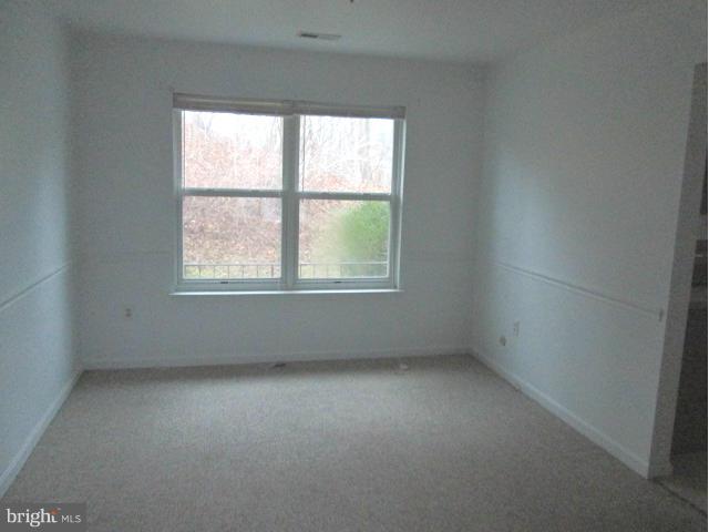 426 Rachaels Way Prince Frederick, MD 20678 - Photo 7 of 22 an empty room with a window
