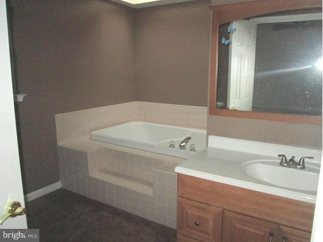 426 Rachaels Way Prince Frederick, MD 20678 - Photo 9 of 22 a bathroom with a sink and a bathtub