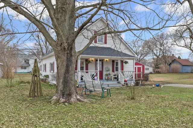 a front view of house with a yard