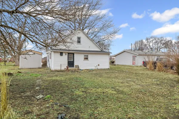 a house view with a garden space