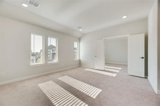 an empty room with windows