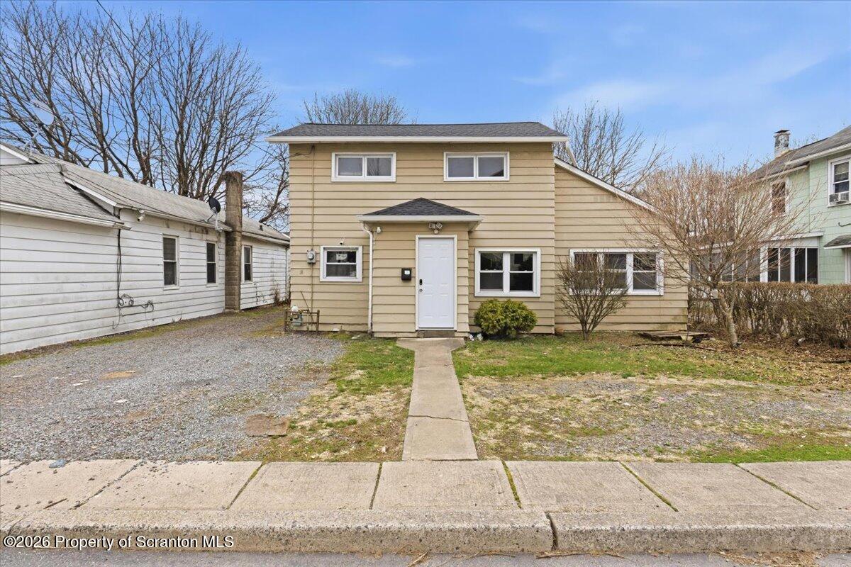 18 Linden Street Luzerne, PA 18709 - Photo 1 of 32 a front view of a house with a yard