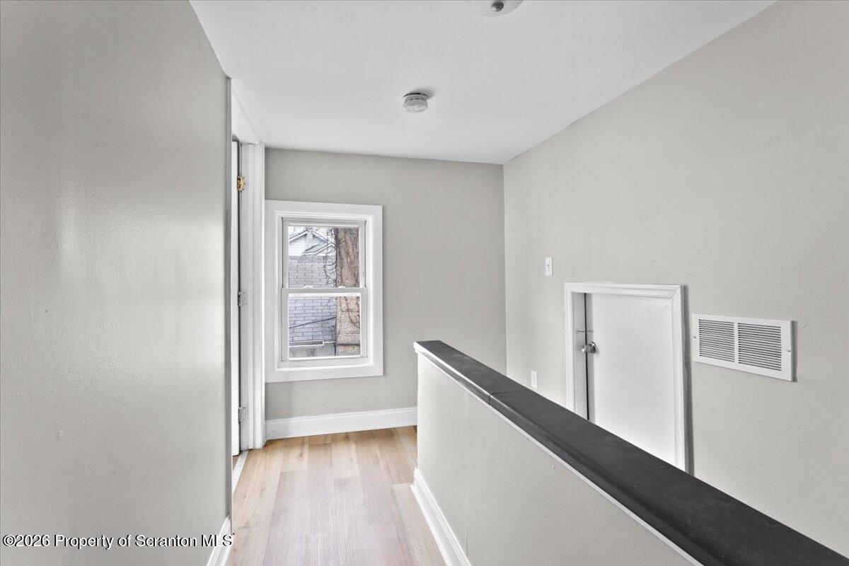 18 Linden Street Luzerne, PA 18709 - Photo 18 of 32 a view of an empty room with a window