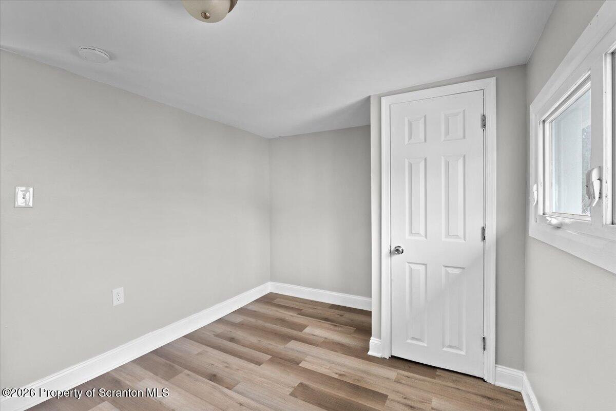 18 Linden Street Luzerne, PA 18709 - Photo 26 of 32 a view of empty room with wooden floor