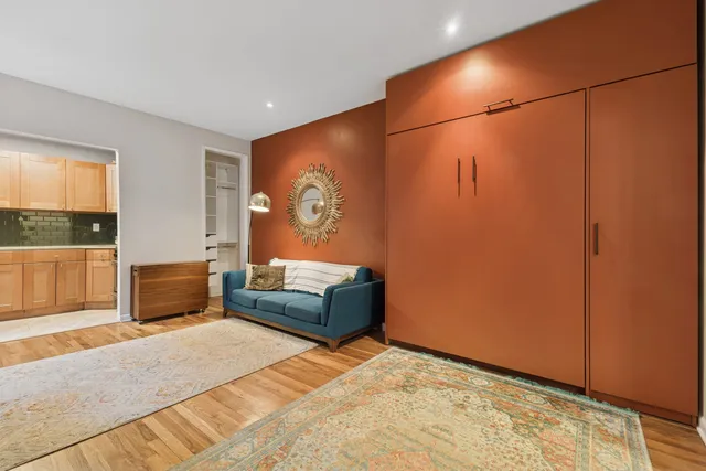 a living room with furniture and a table