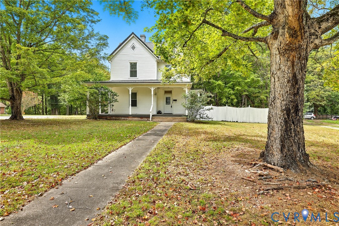 a view of house with a garden