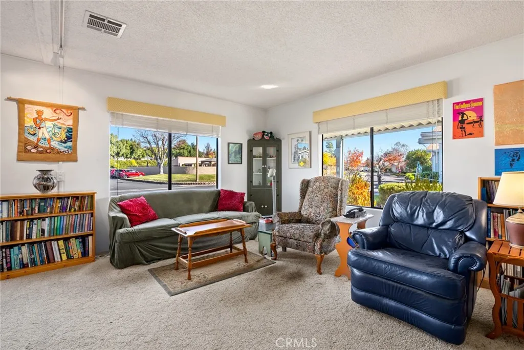 334 Bobwhite Paso Robles, CA 93446 - Photo 4 of 23 a living room with furniture and a flat screen tv