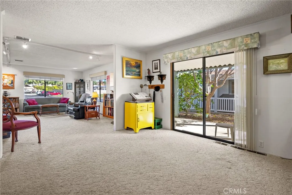 334 Bobwhite Paso Robles, CA 93446 - Photo 10 of 23 a living room with furniture and a flat screen tv