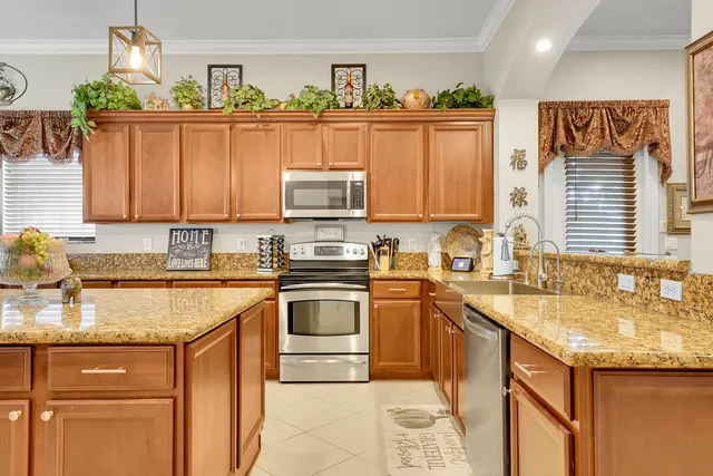 a bedroom with furniture and a flat screen tv