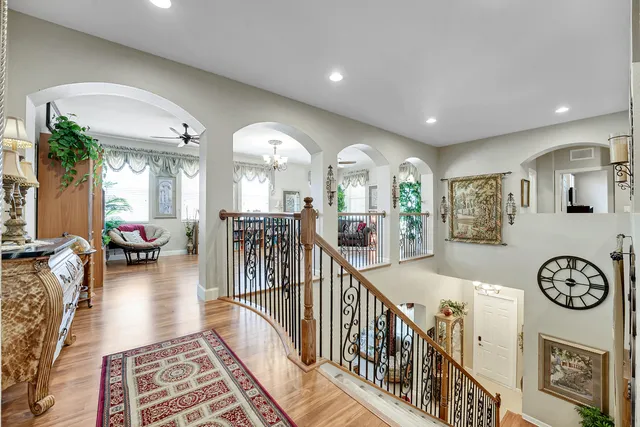 a bedroom with a bed and a table with chair