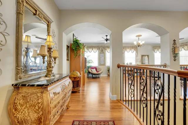 a view of a house with a yard porch and furniture