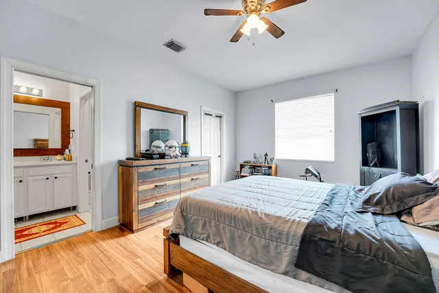 an aerial view of house with yard and mountain view in back