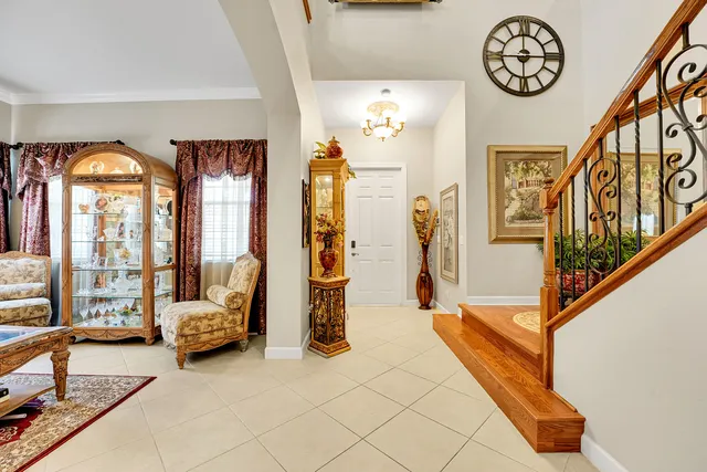 a view of entryway and hall with dining room