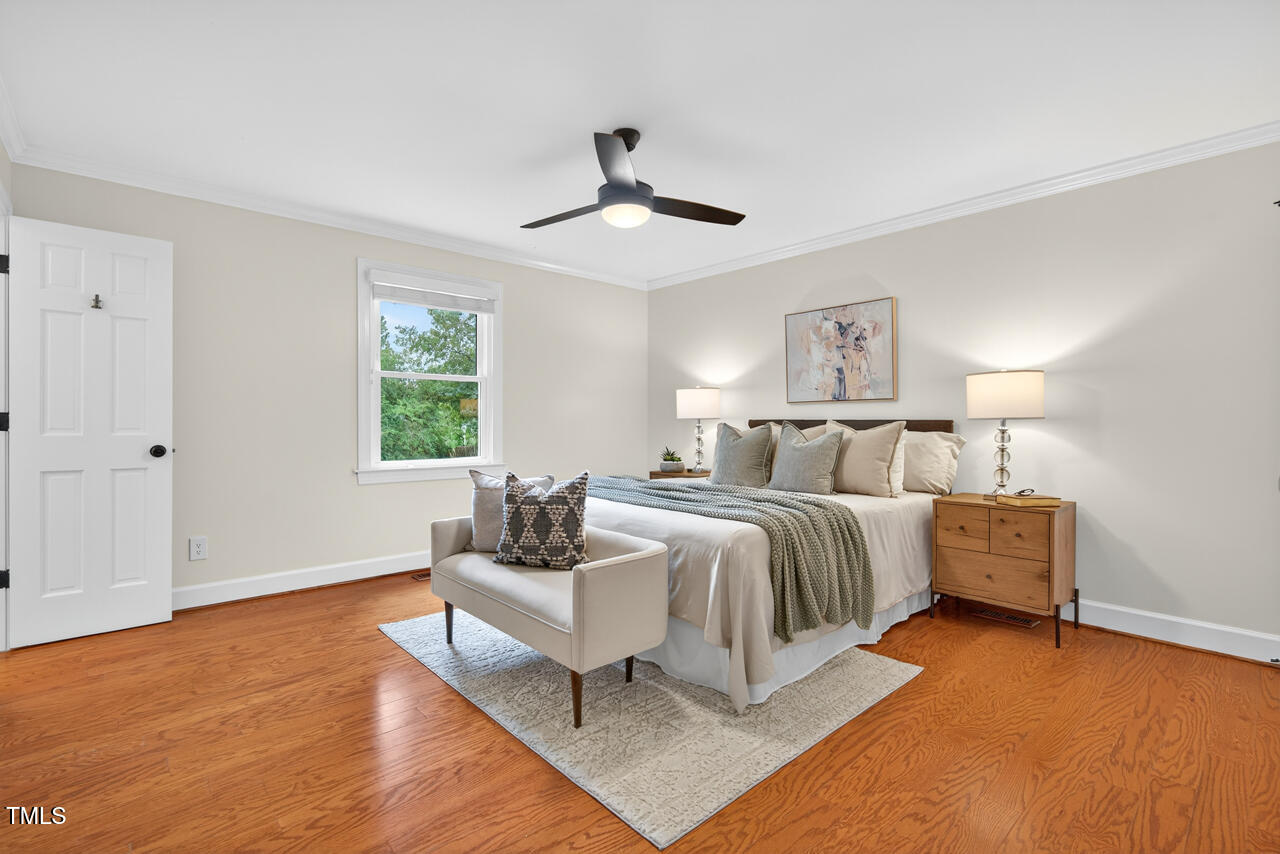 2805 Dunkirk Drive Raleigh, NC 27613 - Photo 16 of 36 a bedroom with bed and a window