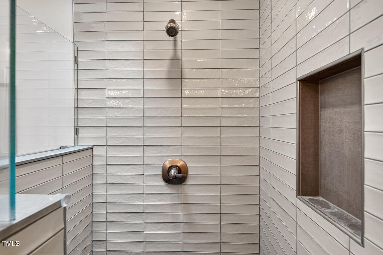 2805 Dunkirk Drive Raleigh, NC 27613 - Photo 20 of 36 a bathroom with a shower