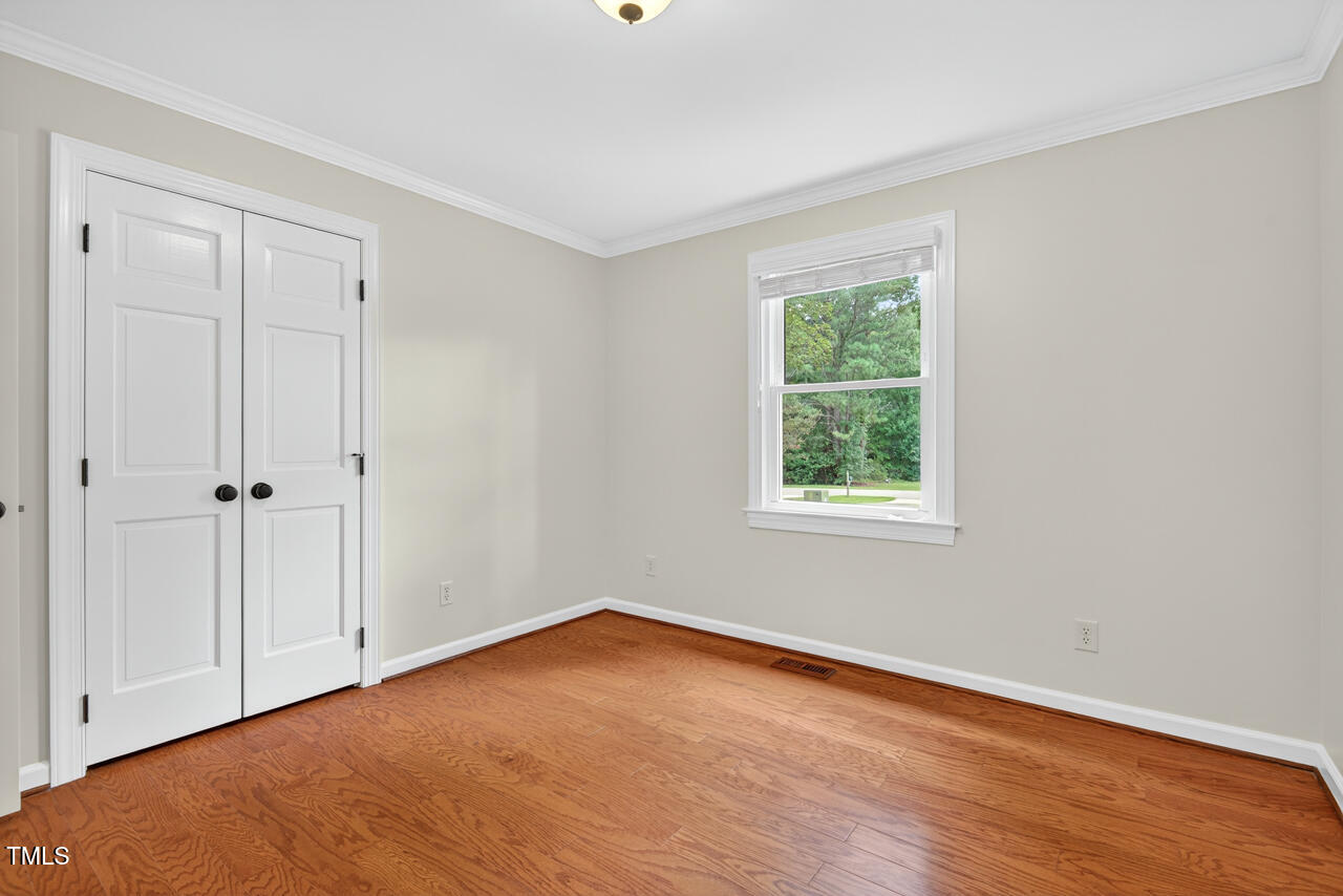 2805 Dunkirk Drive Raleigh, NC 27613 - Photo 23 of 36 a view of a room that has a window in it