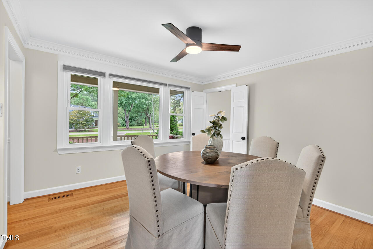 2805 Dunkirk Drive Raleigh, NC 27613 - Photo 5 of 36 a dining room with furniture and window
