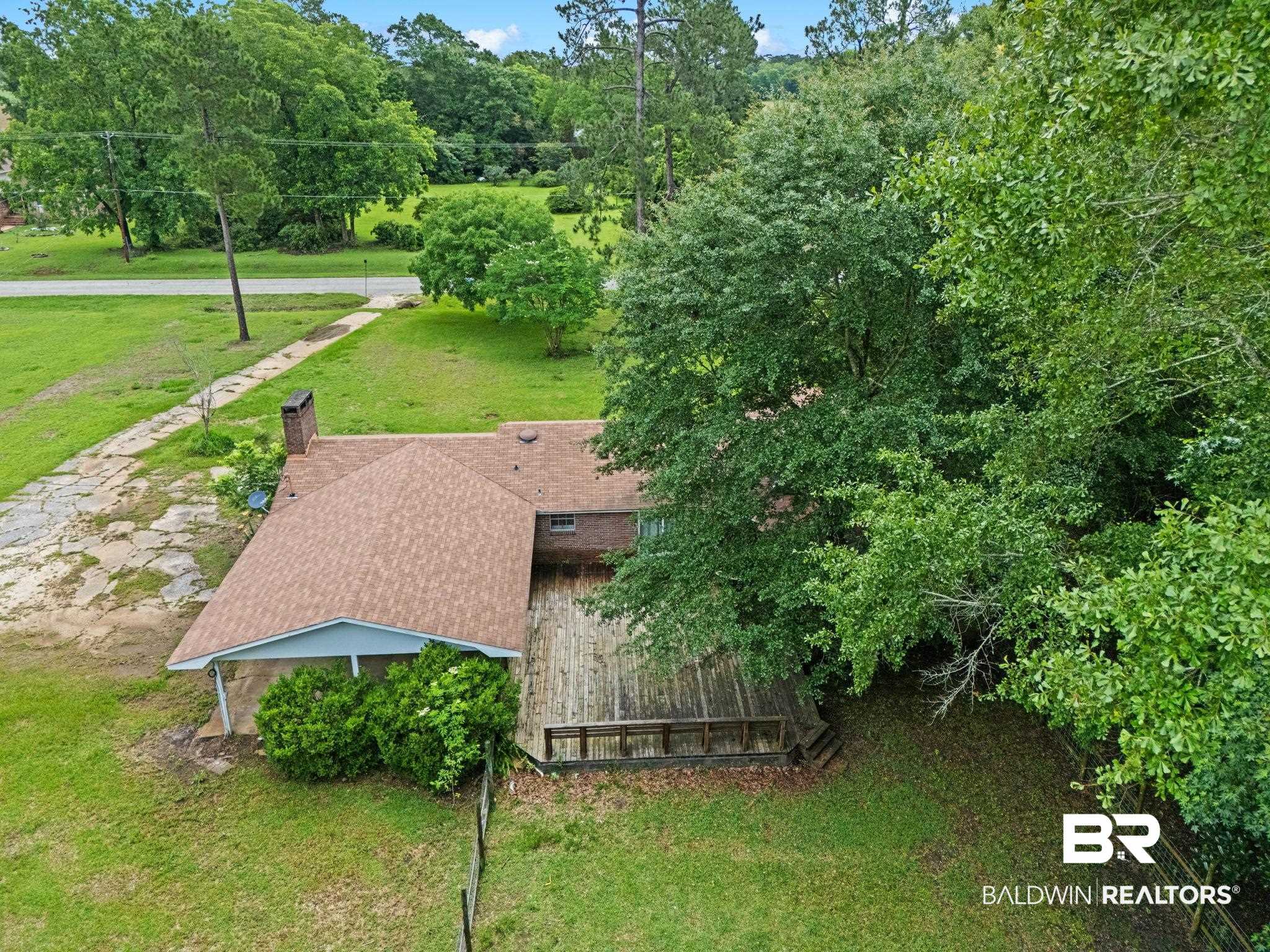384 Old Bratt Road Atmore, AL 36502 - Photo 55 of 64 Expansive wood deck offering outdoor leisure space