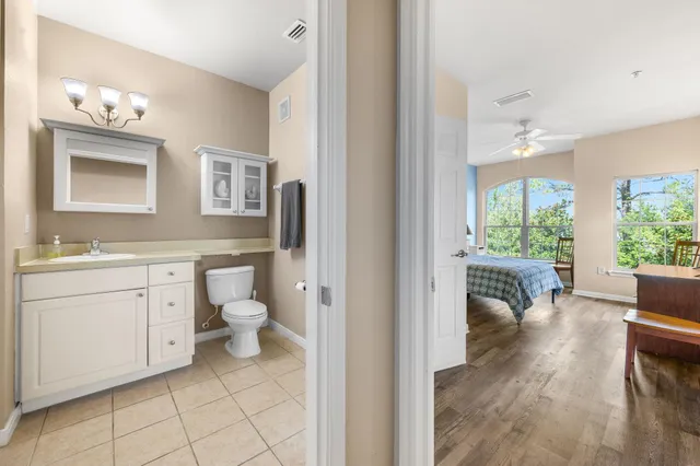 a view of a house with a swimming pool and a yard