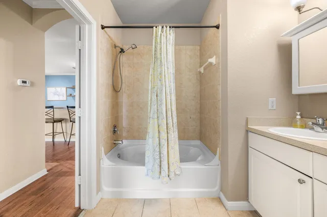 a view of swimming pool with a yard and sitting space