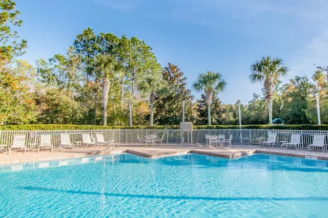 a view of a water fountain in front of a house