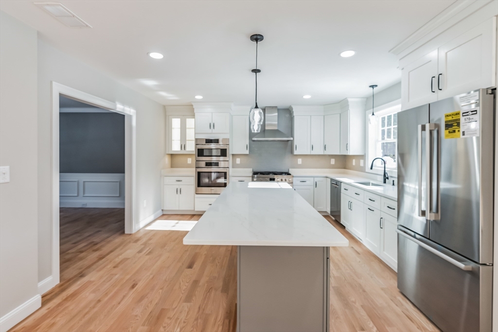 Lot B Georgianna Road Billerica, MA 01821 - Photo 7 of 32 a kitchen with stainless steel appliances a refrigerator sink and cabinets