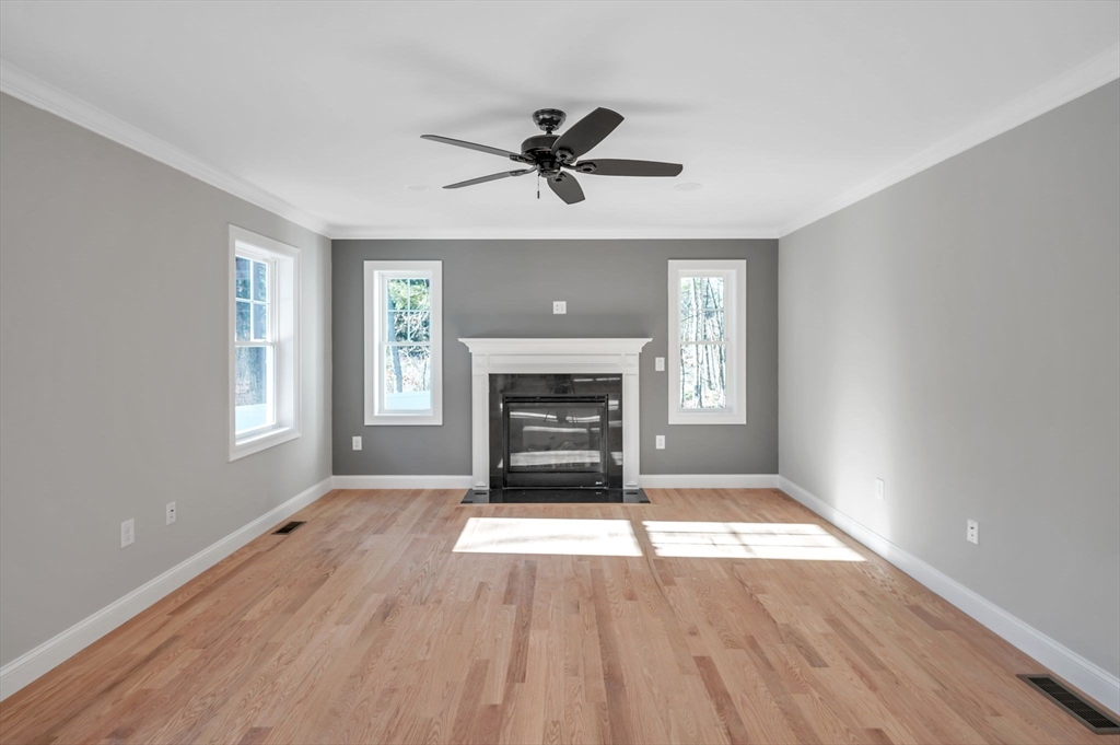 Lot B Georgianna Road Billerica, MA 01821 - Photo 9 of 32 an empty room with windows and fireplace
