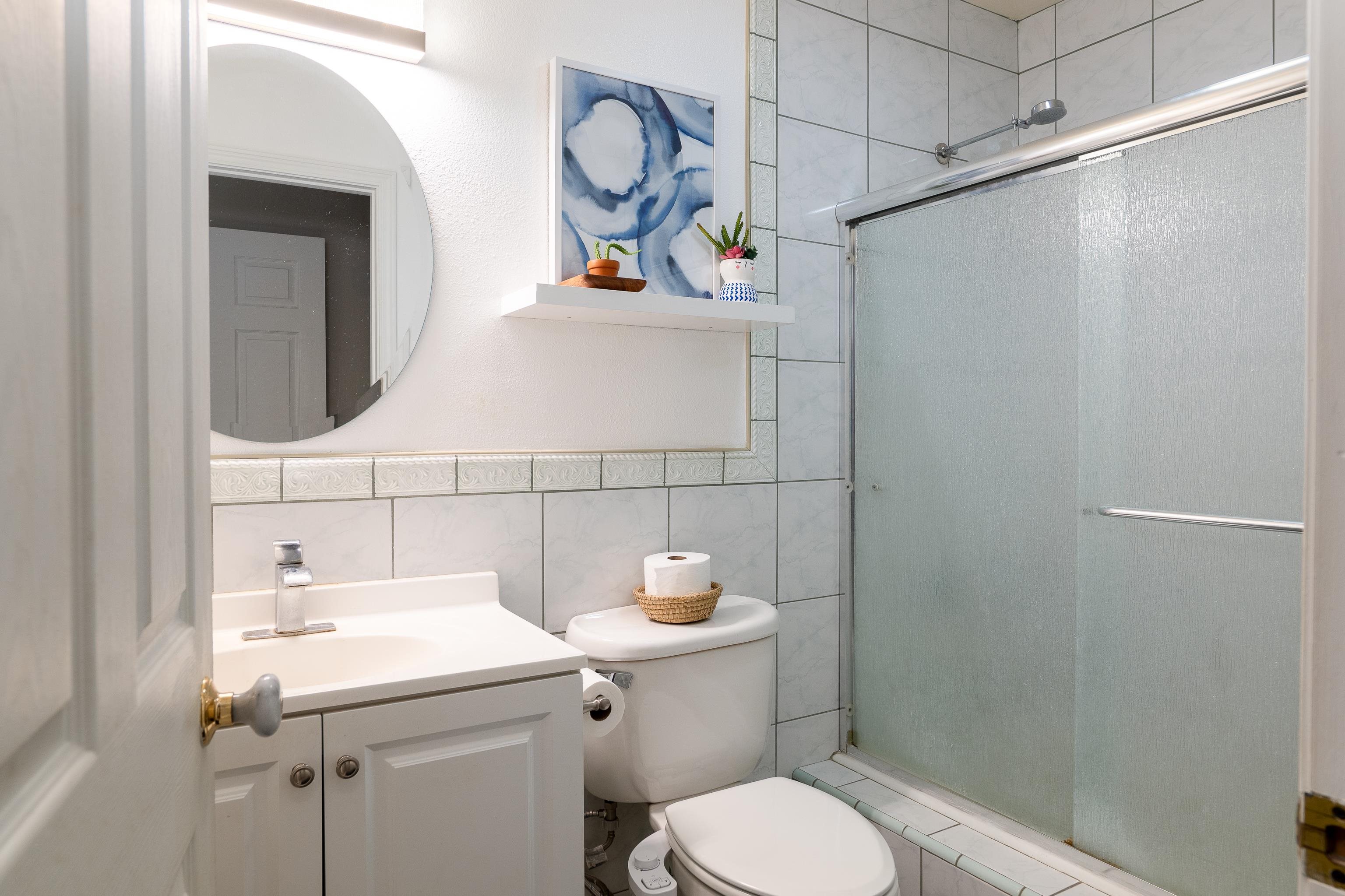 52 Kuukama Street Kahului, HI 96732 - Photo 18 of 28 a bathroom with a sink a toilet and shower