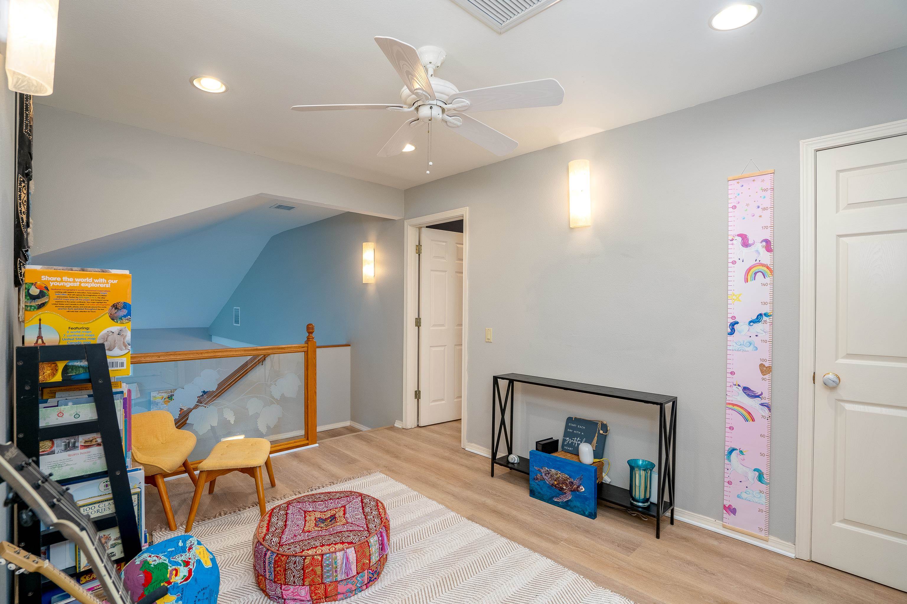 52 Kuukama Street Kahului, HI 96732 - Photo 21 of 28 a bedroom with furniture and a chandelier fan