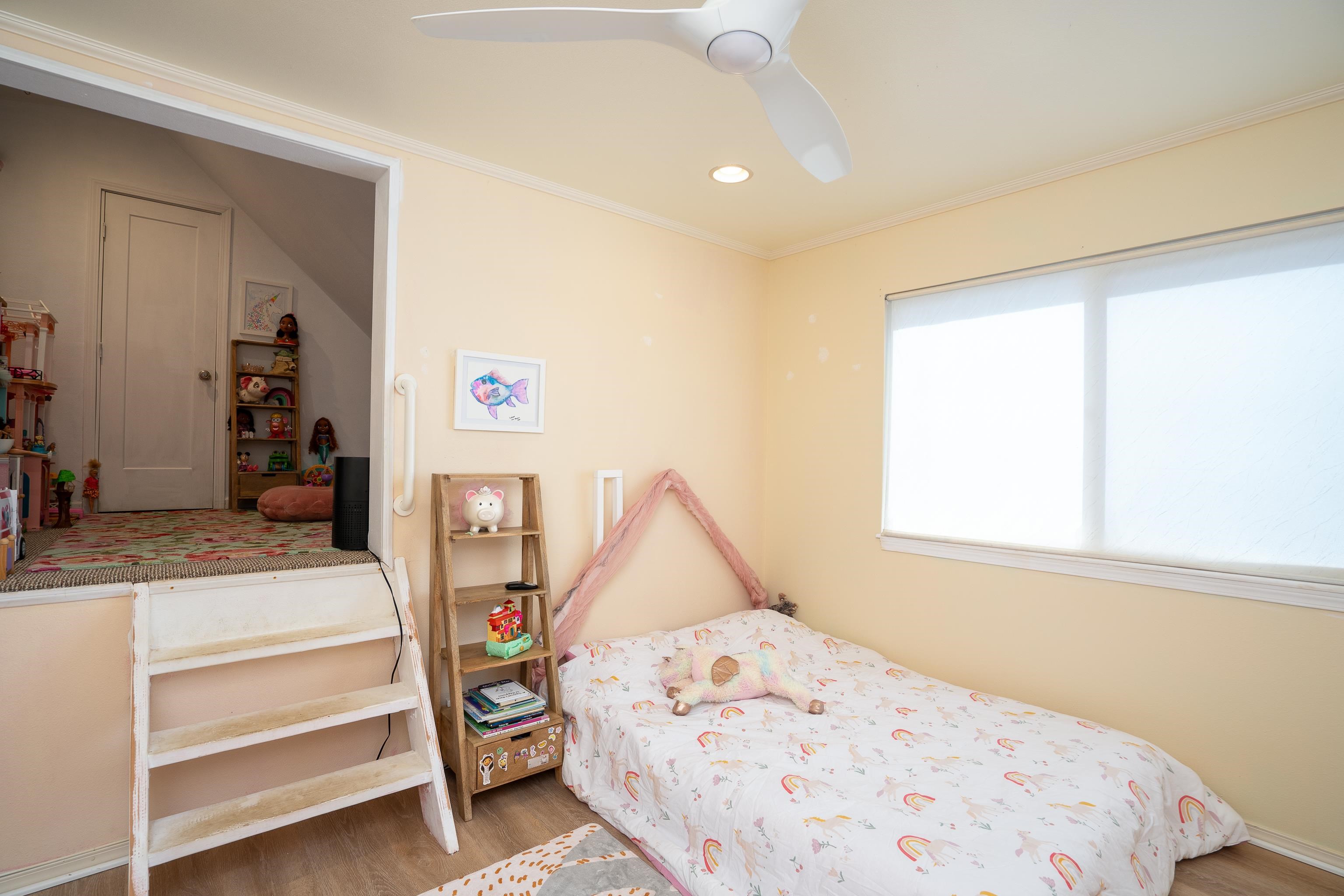 52 Kuukama Street Kahului, HI 96732 - Photo 22 of 28 a bedroom with a bed and a window