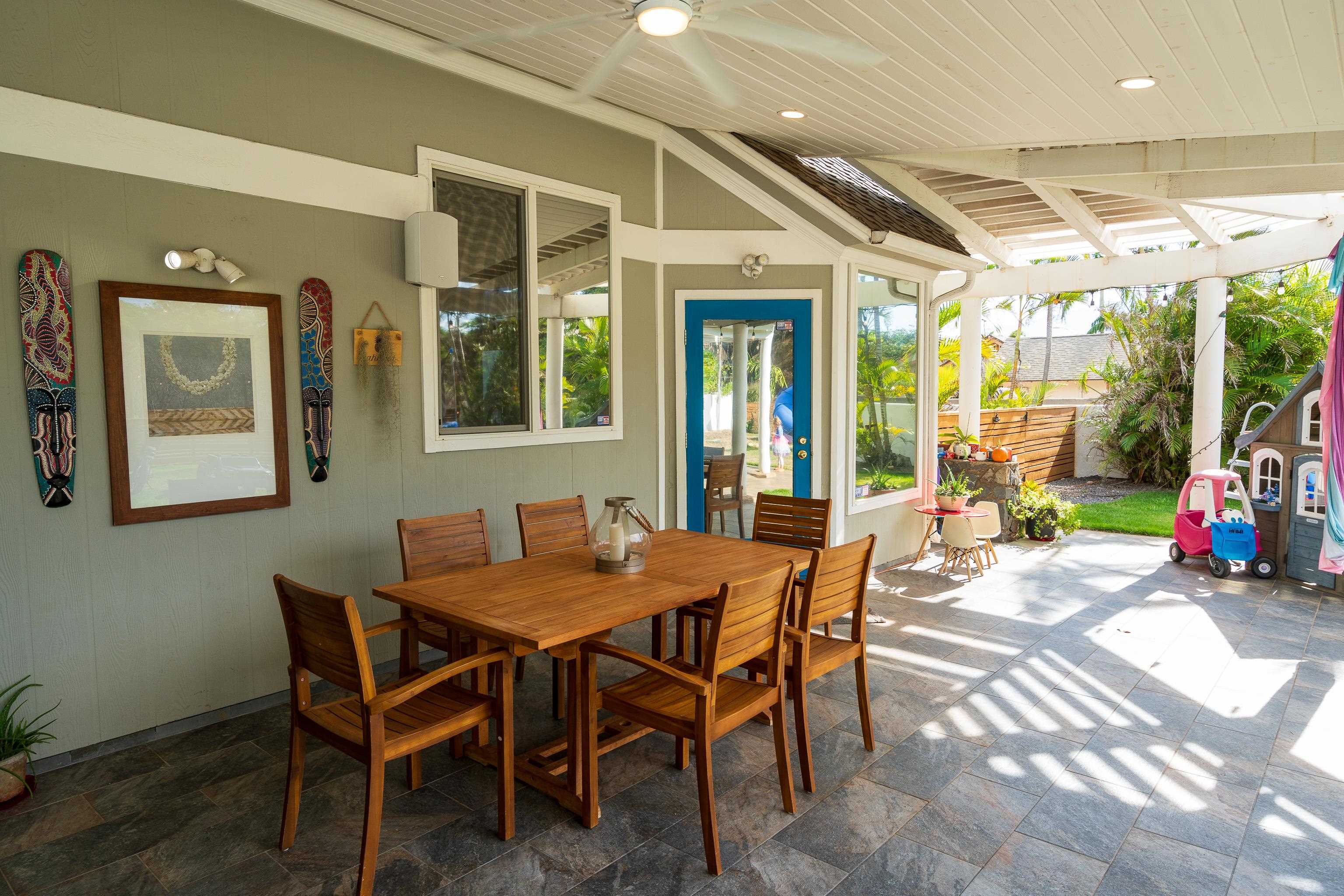 52 Kuukama Street Kahului, HI 96732 - Photo 3 of 28 a view of a dining room with furniture large windows and wooden floor