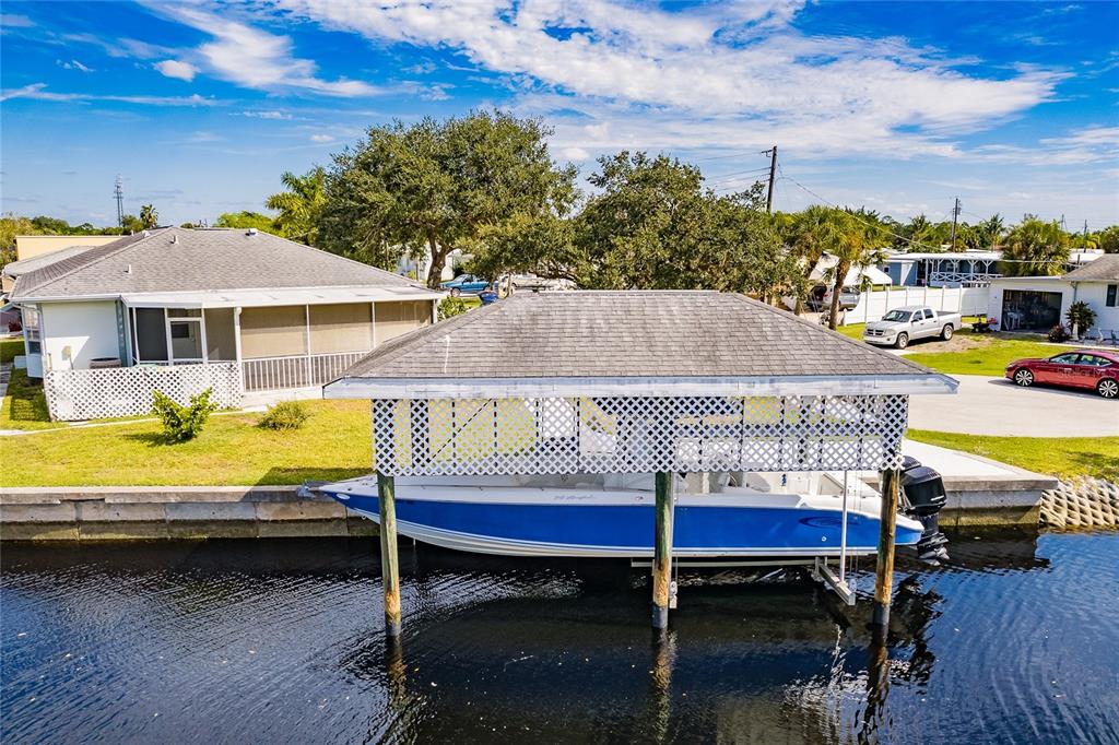 4241 Bardot Road Port Charlotte, FL 33953 - Photo 39 of 50 DOCK & BOAT LIFT
