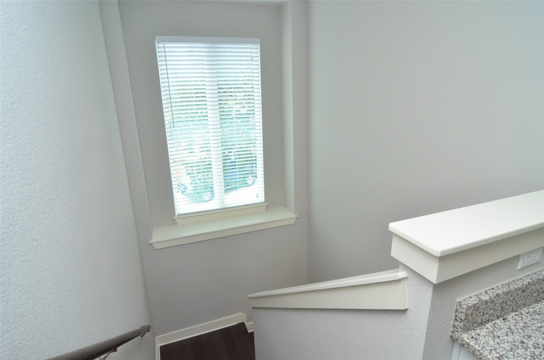 1916 Cleese Drive Austin, TX 78741 - Photo 15 of 36 Natural light filters through the window, illuminating the staircase with ease.