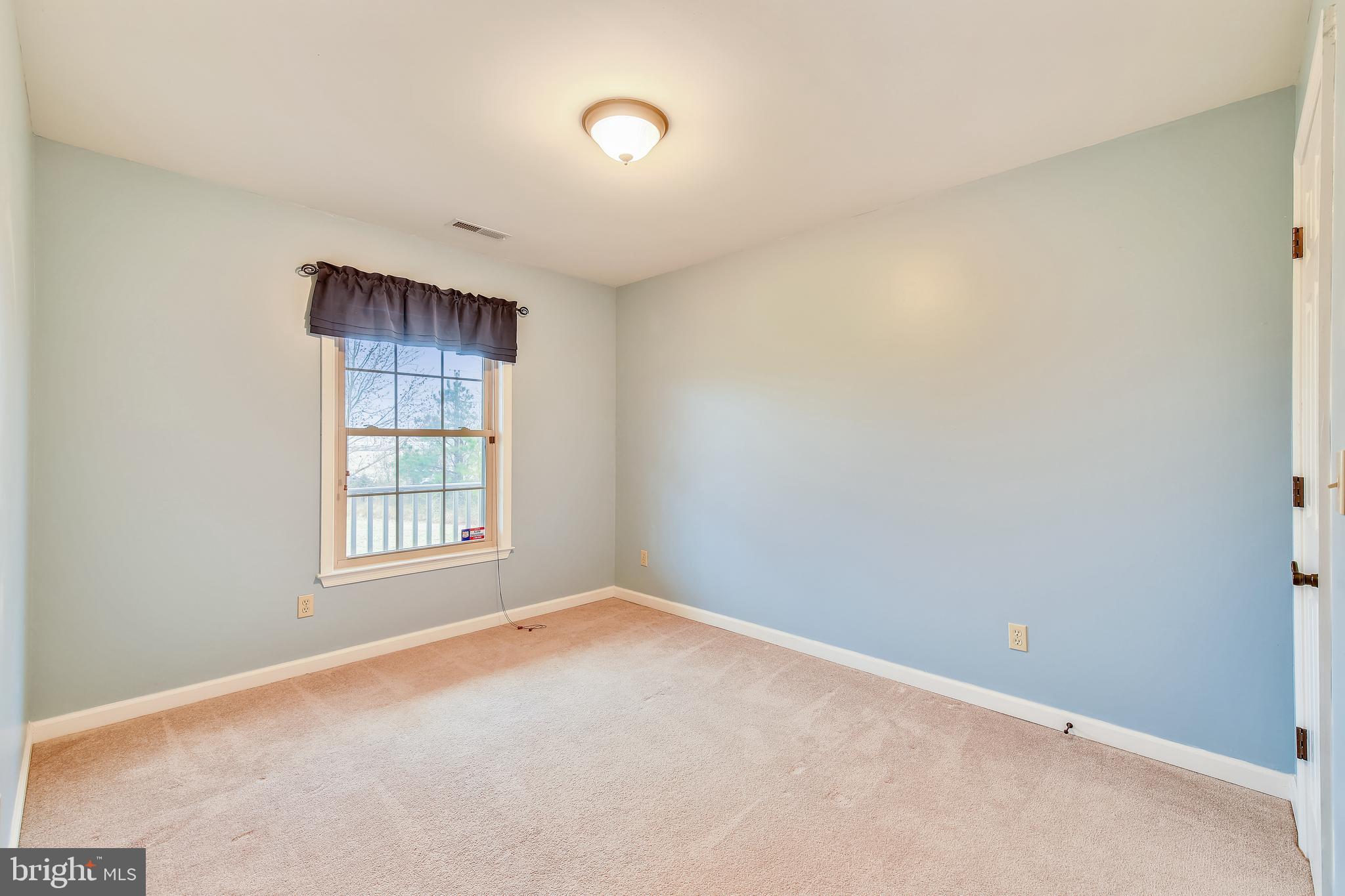 9248 Bethel Road Willards, MD 21874 - Photo 28 of 47 an empty room with a window