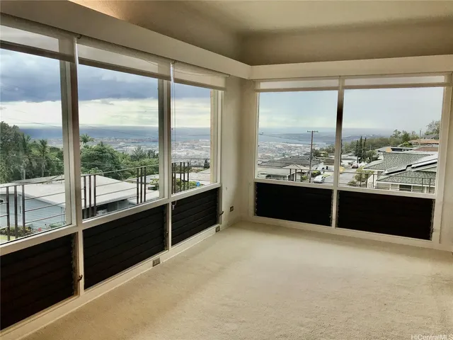 a view of a large window with a view of the ocean