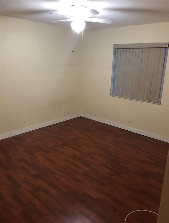 Davie Davie, FL 33024 - Photo 5 of 5 a view of an empty room with wooden floor