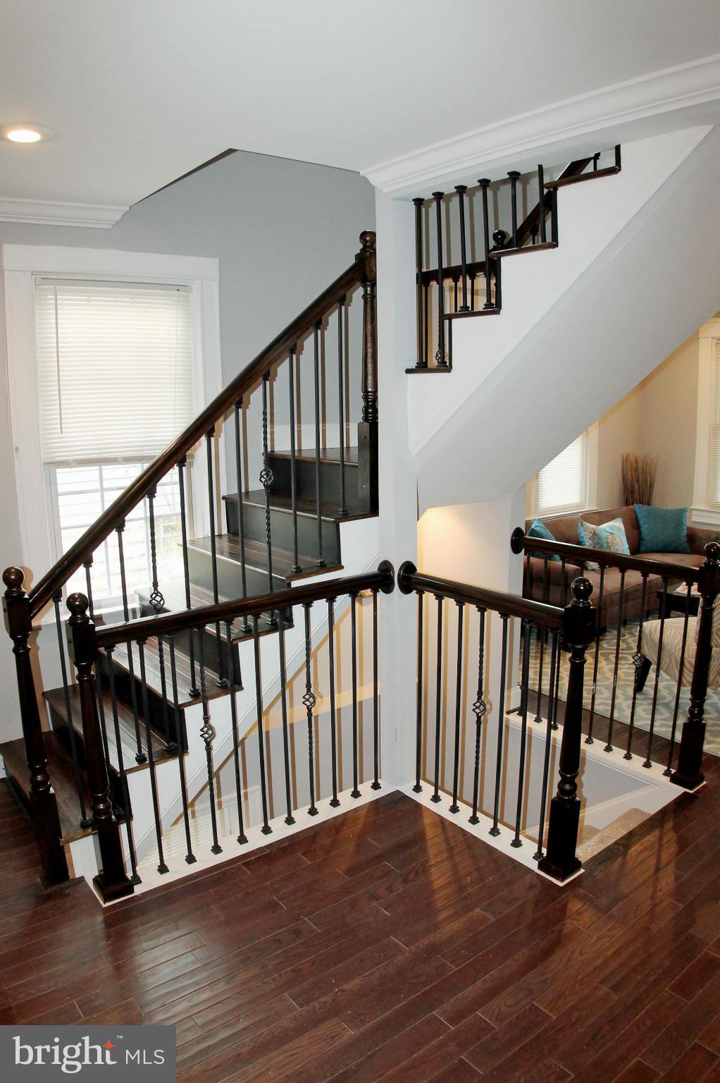 5510 Tramore Road Baltimore, MD 21214 - Photo 14 of 30 a view of staircase with railing and white walls