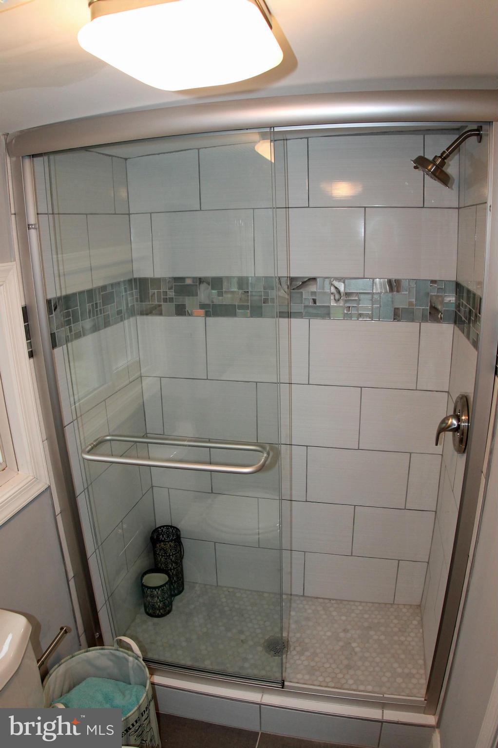5510 Tramore Road Baltimore, MD 21214 - Photo 22 of 30 a bathroom with a shower