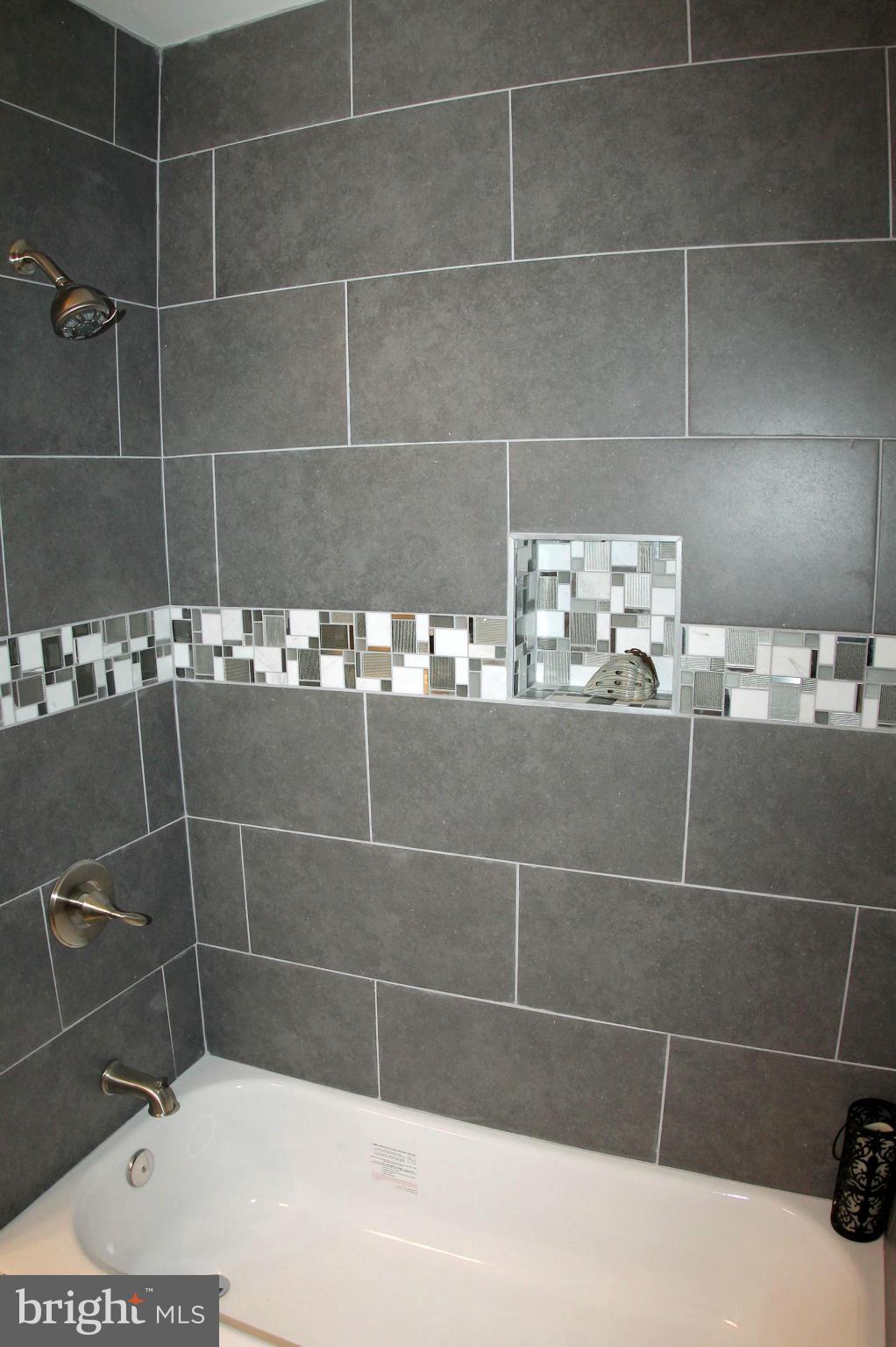 5510 Tramore Road Baltimore, MD 21214 - Photo 28 of 30 a bathroom with a shower