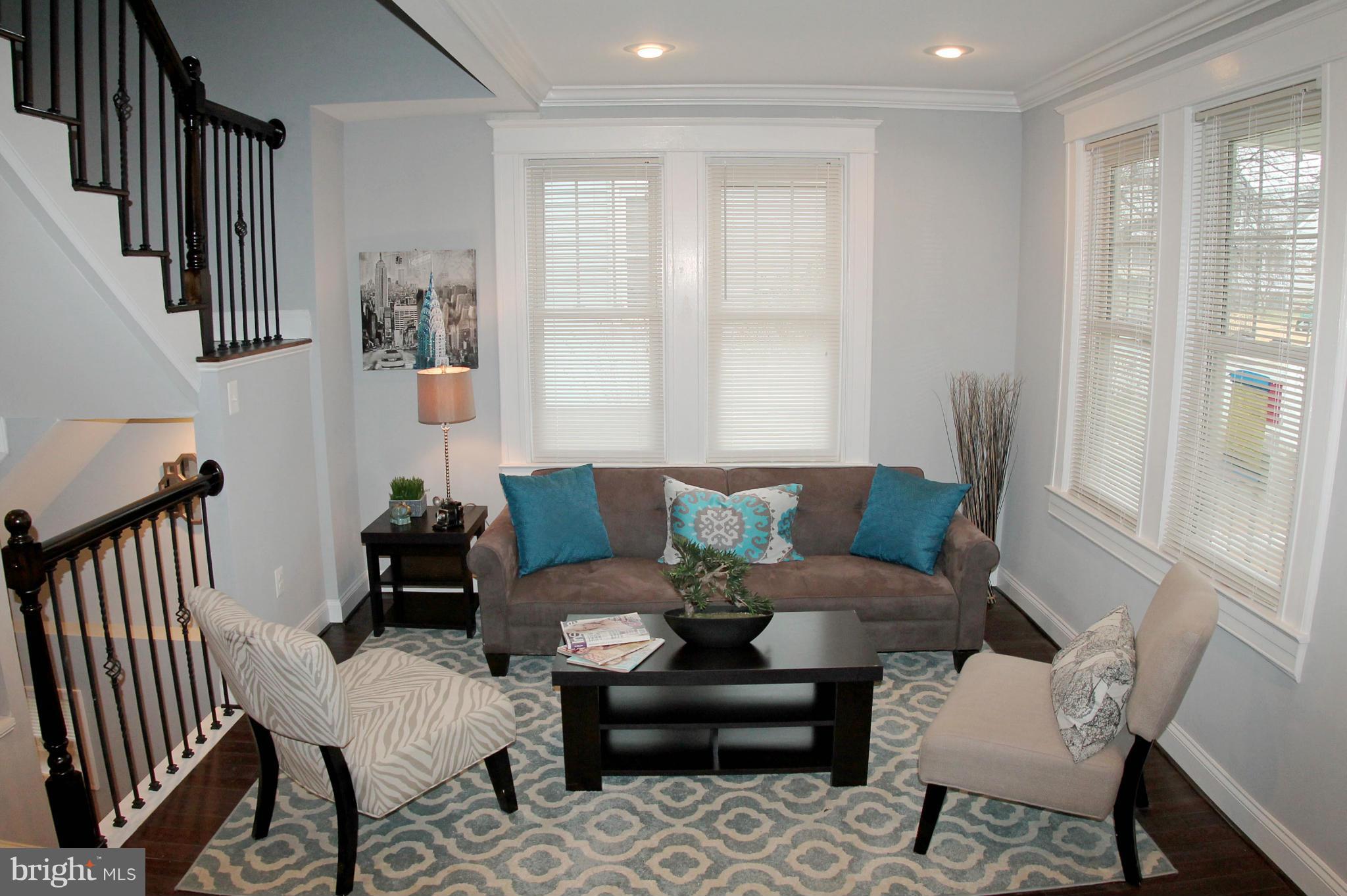 5510 Tramore Road Baltimore, MD 21214 - Photo 4 of 30 a living room with furniture and a window